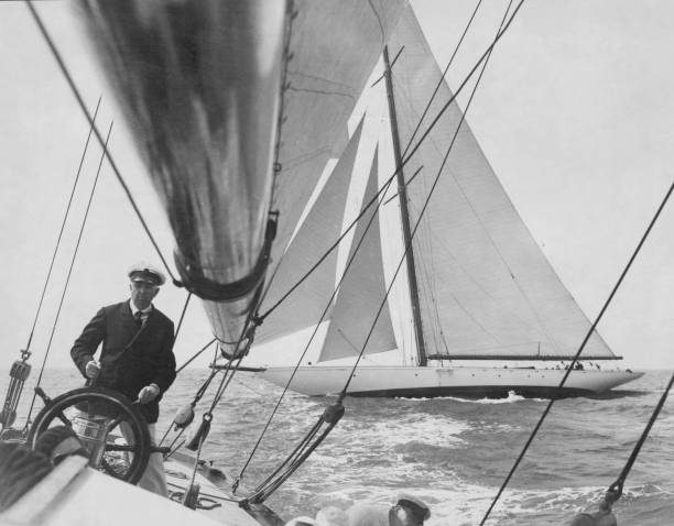Sir Thomas Sopwith at the helm during a J-class race